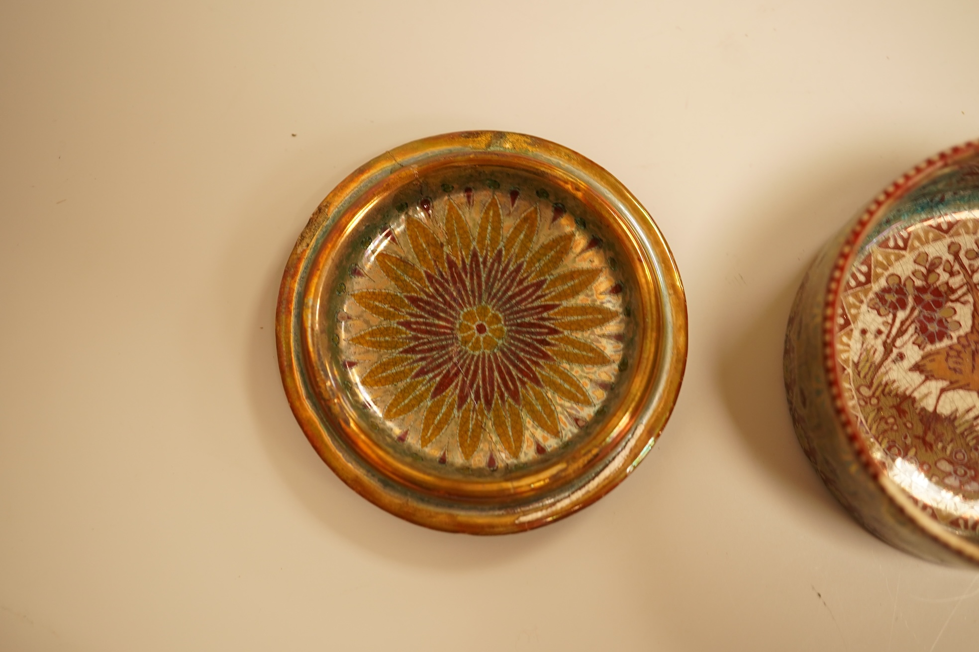 A Zsolnay lustre 'chicken' box and cover and two Sevres style porcelain boxes and covers (3) ‘chicken box’ 5cm diameter.